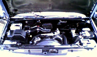 A car engine; Actual Size=240 pixels wide